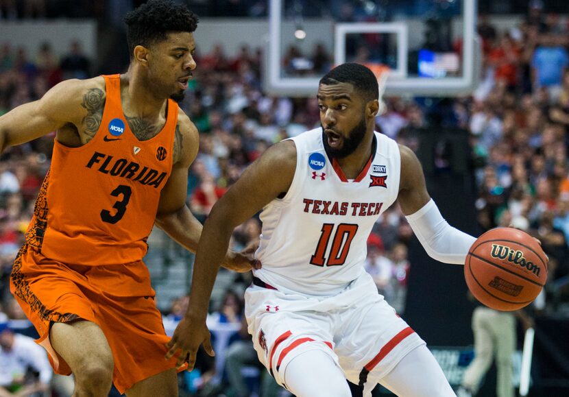 Texas Tech Red Raiders guard Niem Stevenson (10) gets around Florida Gators guard Jalen...