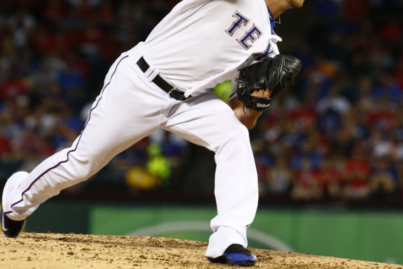 Texas Rangers relief pitcher Anthony Bass (63) pitches in the sixth inning against the...