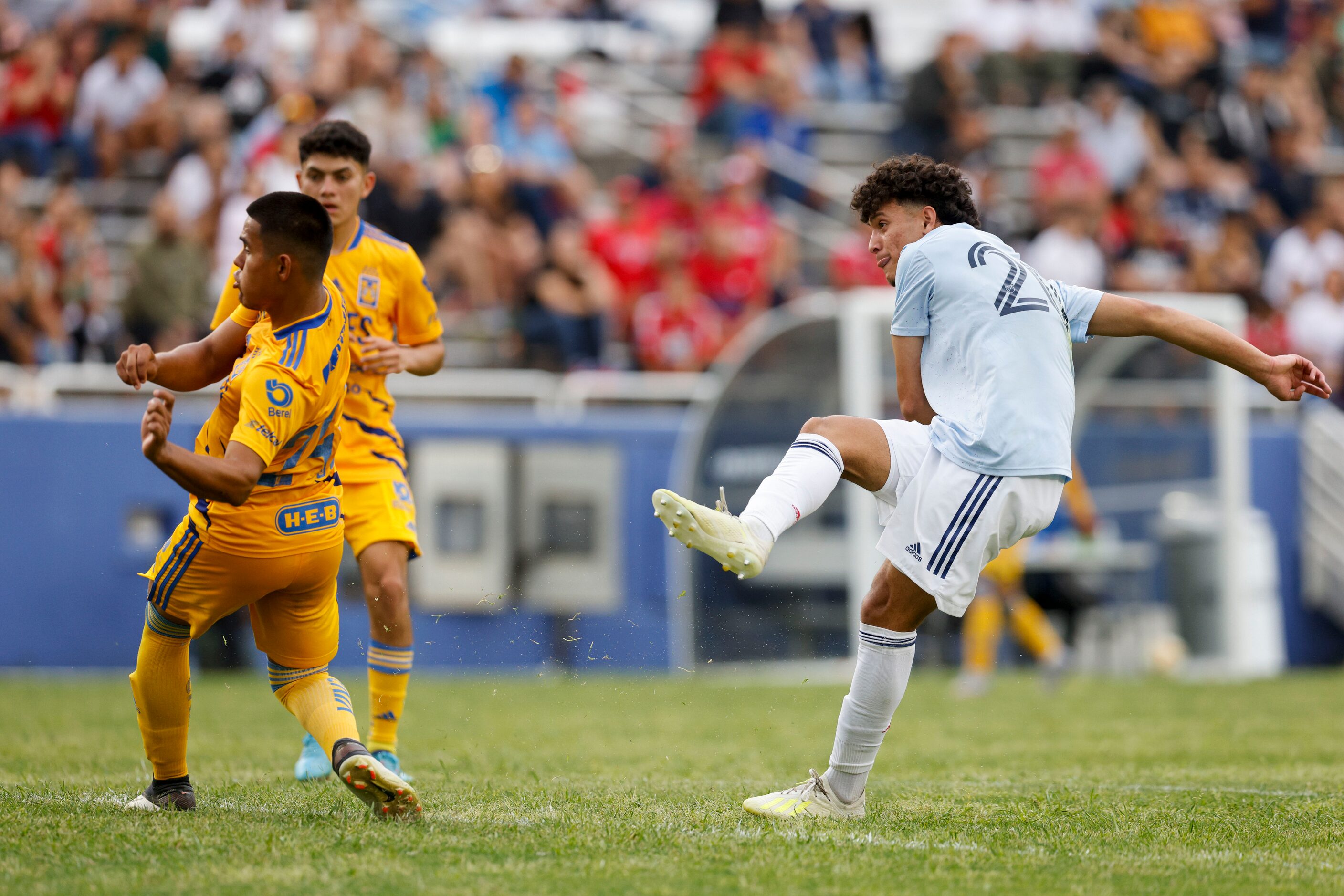 FC Dallas’ Emanuel Martinez attempts a shot on goal around Tigres UANL defender Miguel Angel...