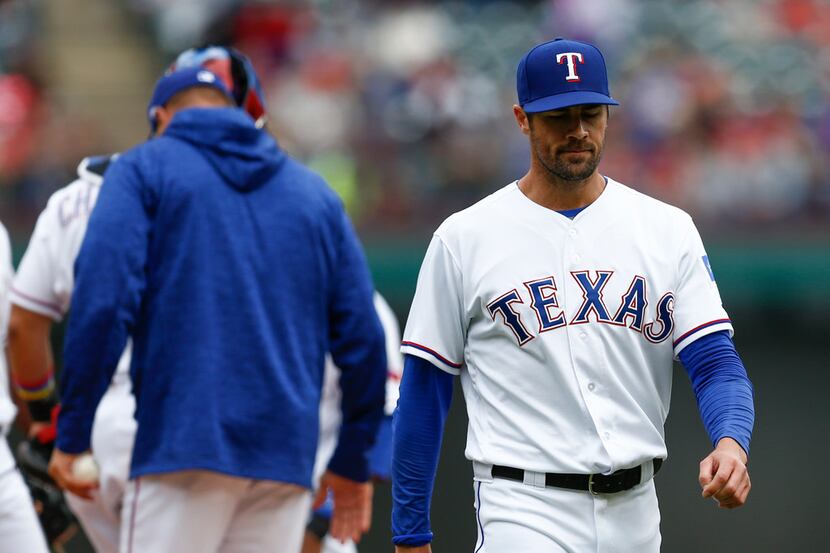 Texas Rangers starting pitcher Cole Hamels (35) leaves the game against the Toronto Blue...