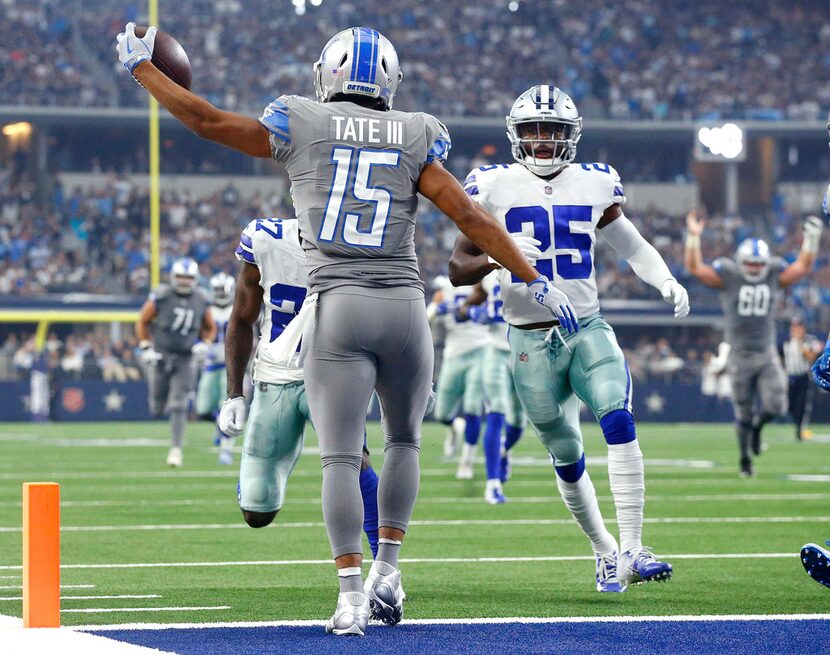 Detroit Lions wide receiver Golden Tate (15) stops at the goal line and steps backwards for...