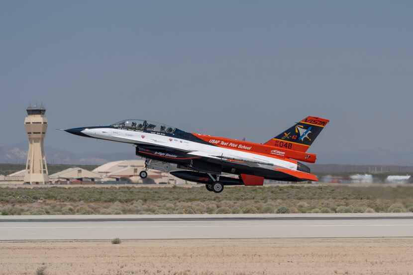 The X-62A VISTA aircraft, an experimental AI-enabled Air Force F-16 fighter jet, takes off...