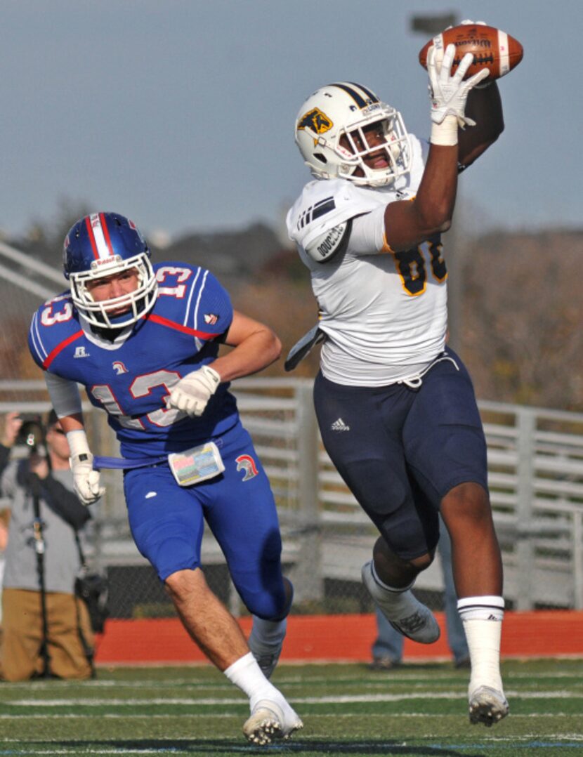 Prestonwood sophomore Michael Irvin (88) catches a pass on the run as TCA - Addison...