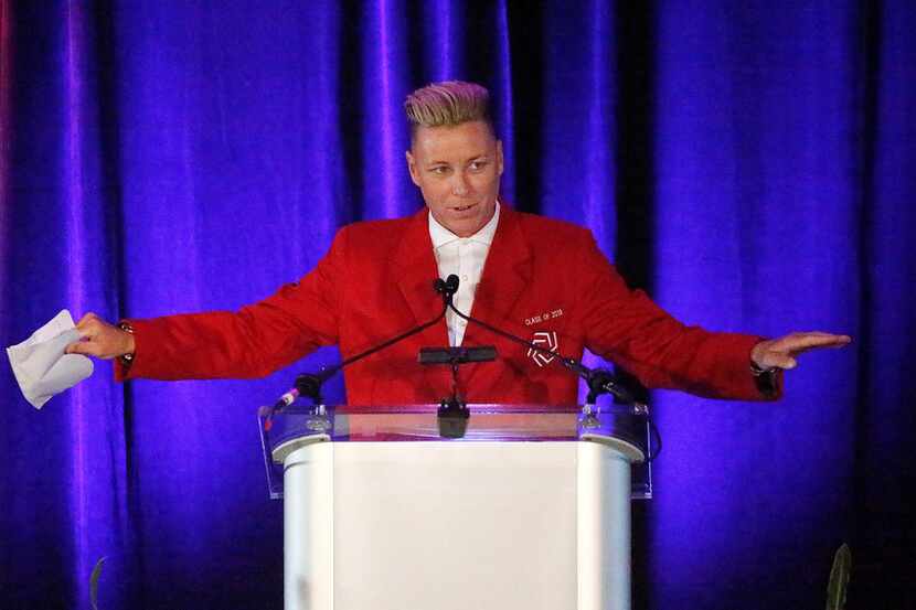 Abby Wambach speaks from the podium during her induction ceremony for the 2019 U.S. Soccer...