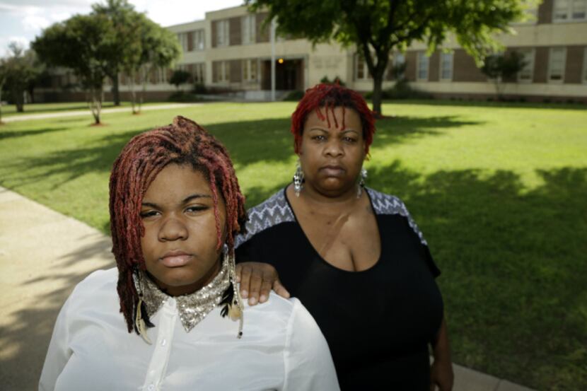 Nicole Pryor (right), with daughter Ashley Brown in front of South Oak Cliff High School,...