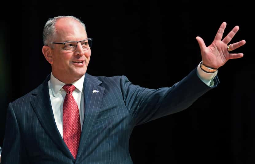 FILE - In this Sept. 19, 2019, file photo, Louisiana Gov. John Bel Edwards acknowledges his...