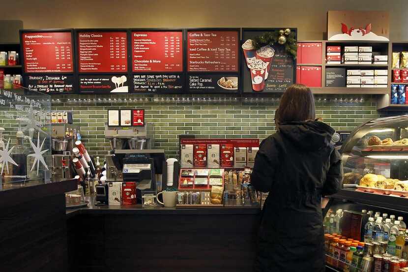 
At Starbucks, those little extras nestled around the register can entice you to spend more...