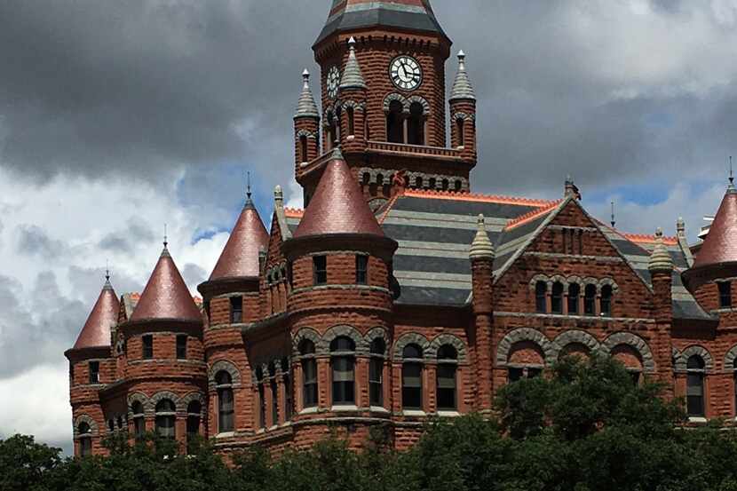 The Old Red Courthouse still stands in downtown Dallas, bounded by Main, Houston and...