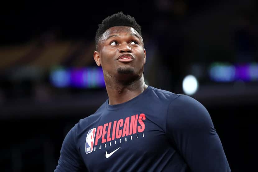 LOS ANGELES, CALIFORNIA - FEBRUARY 25: Zion Williamson #1 of the New Orleans Pelicans warms...