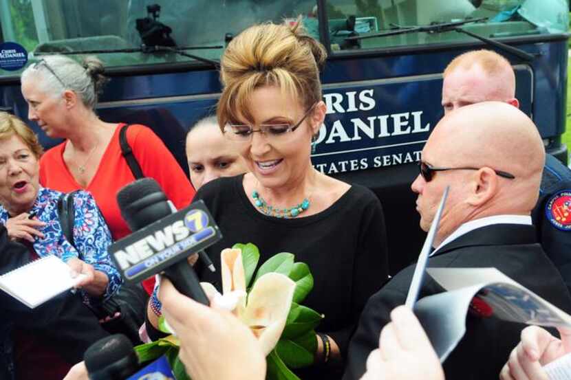 
Former Alaska Gov. Sarah Palin leaves the Jones County Junior College Fine Arts Center in...