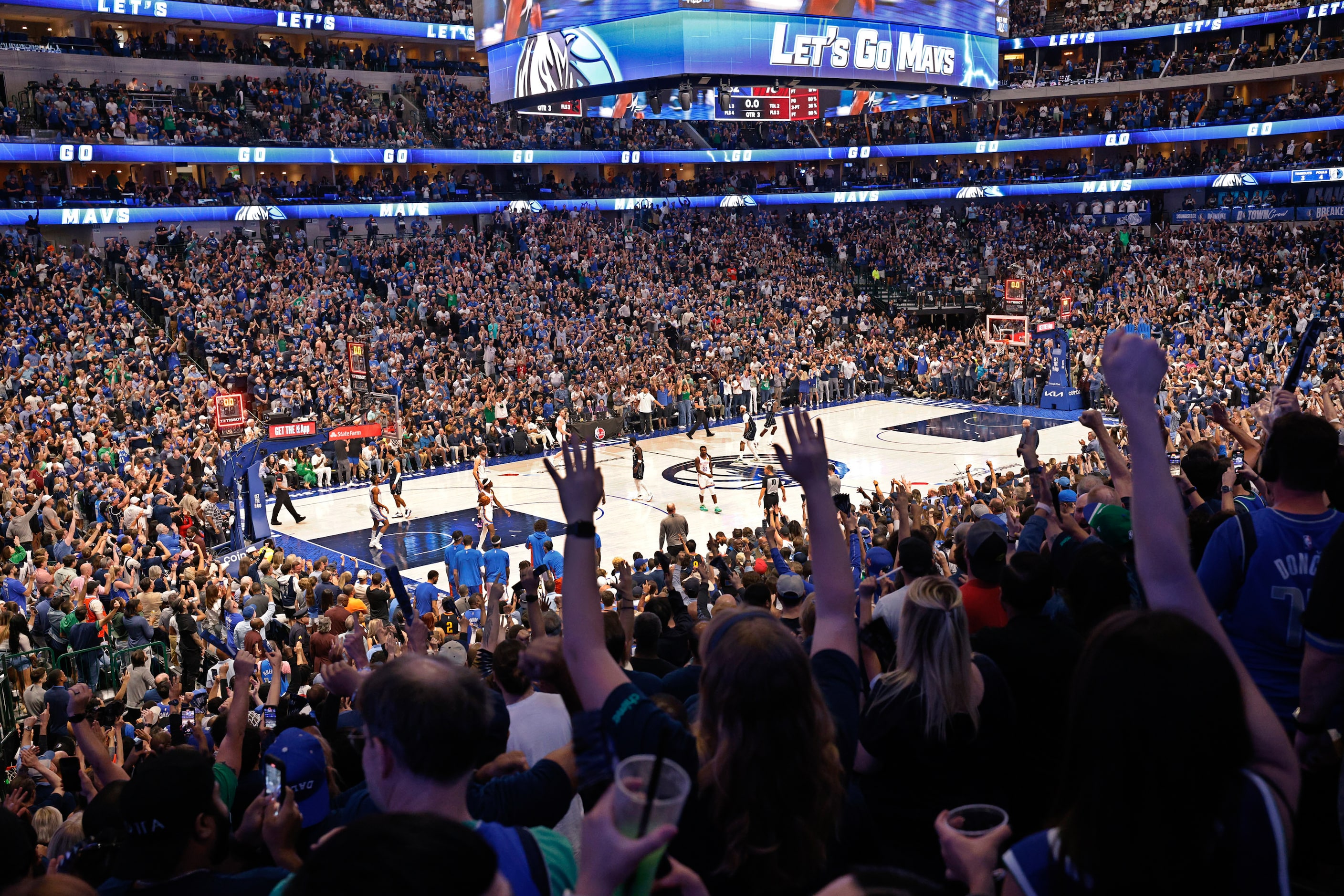 Fans cheer during the second half of Game 3 of an NBA basketball second-round playoff series...