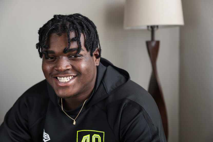 Dallas Cowboys first-round pick Tyler Smith, 21, poses for a portrait at his mother's home...