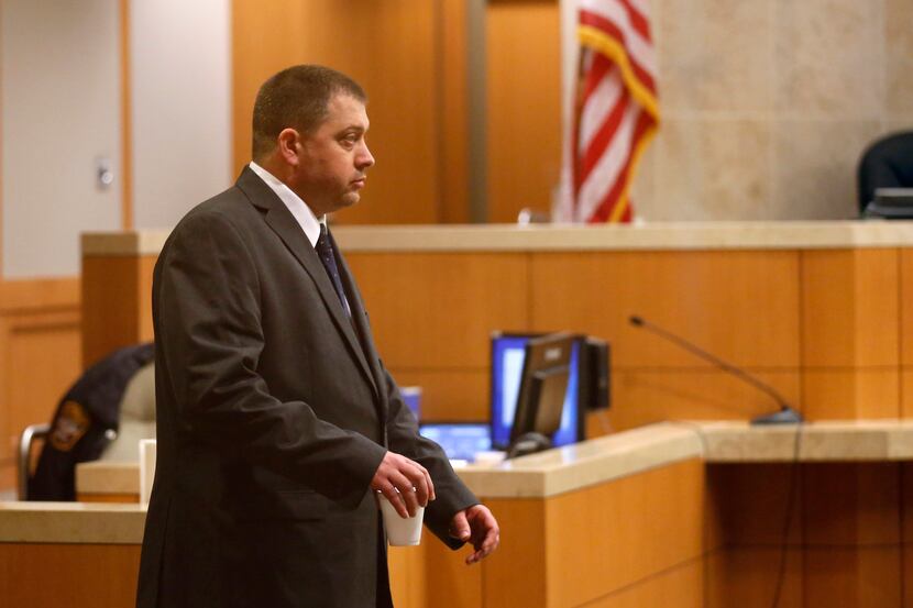 Robert Veal walks to his seat during his capital murder trial in the 199th judicial district...