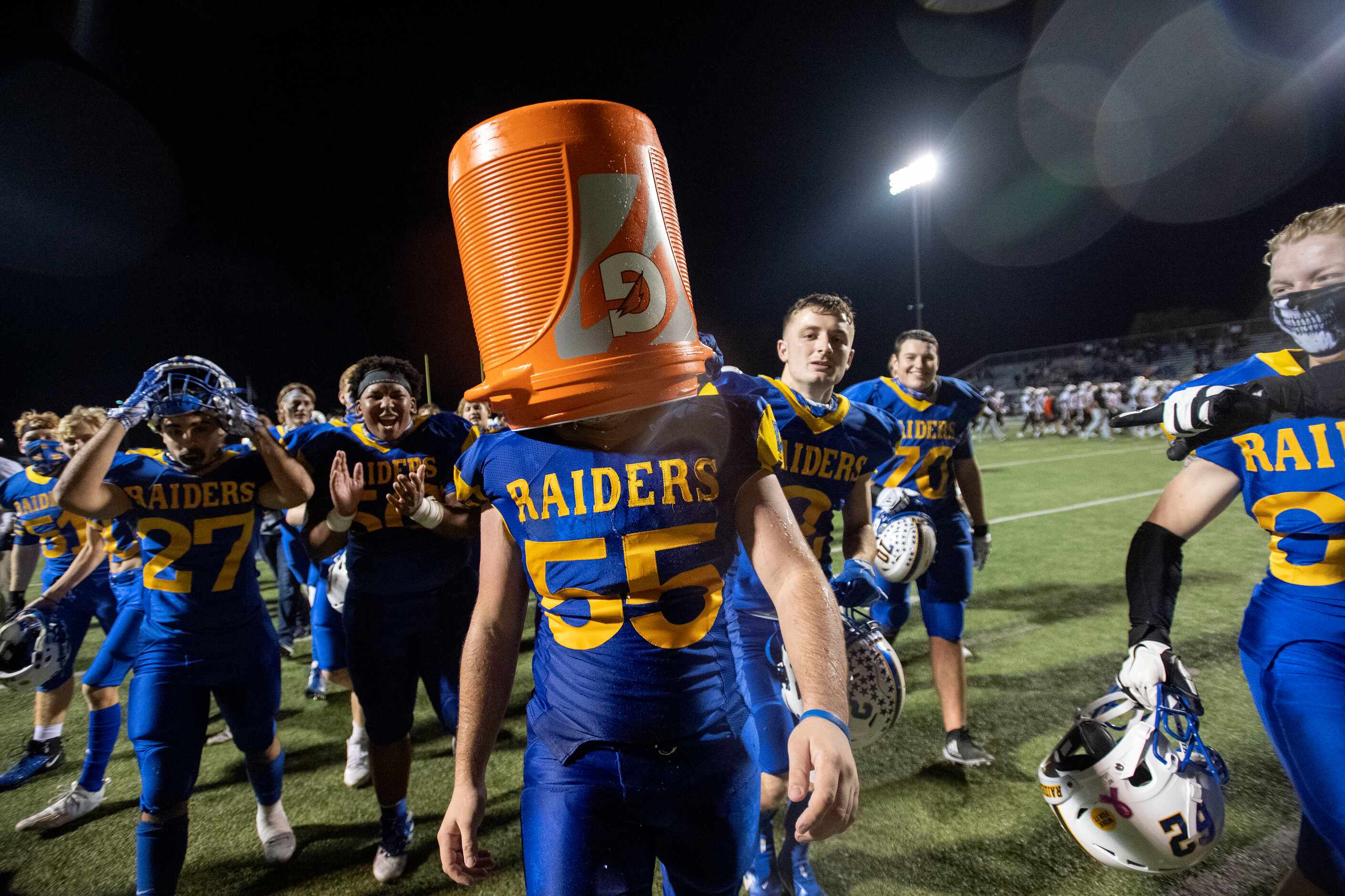 Sunnyvale senior offensive lineman Grey Miller (55) checks out the inside of the water...