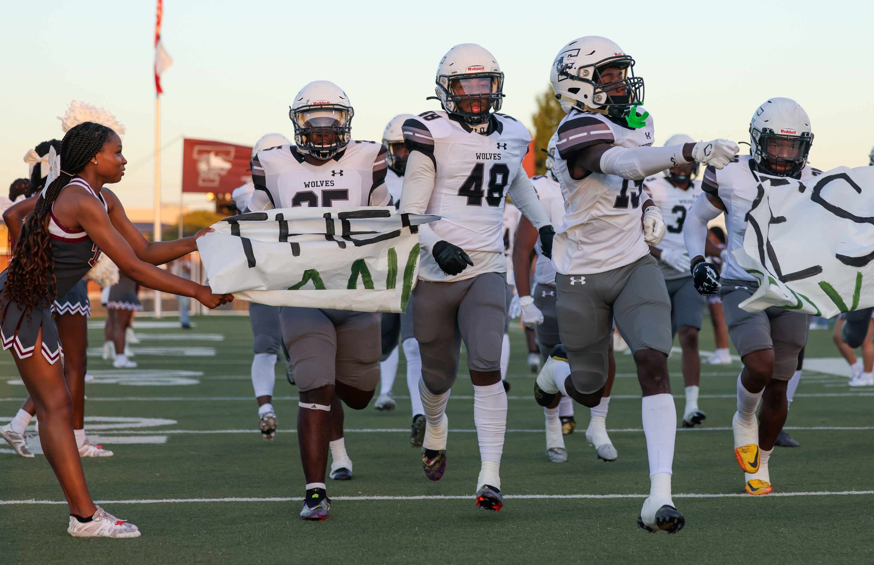 Mansfield Timberview enters the field before a game against Birdville at the Birdville ISD...