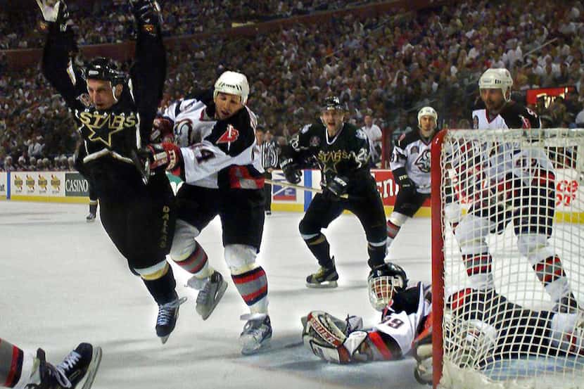Stanley Cup Finals - Stars beat Sabres in series, 4-2 (June 19, 1999): With Brett Hull's...