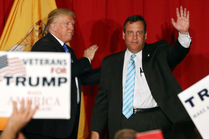 Republican presidential candidate Donald Trump, left, stands with New Jersey Gov. Chris...