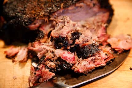 The smoked meats at Oak'd include chopped pork butt (pictured) plus brisket, beef ribs,...