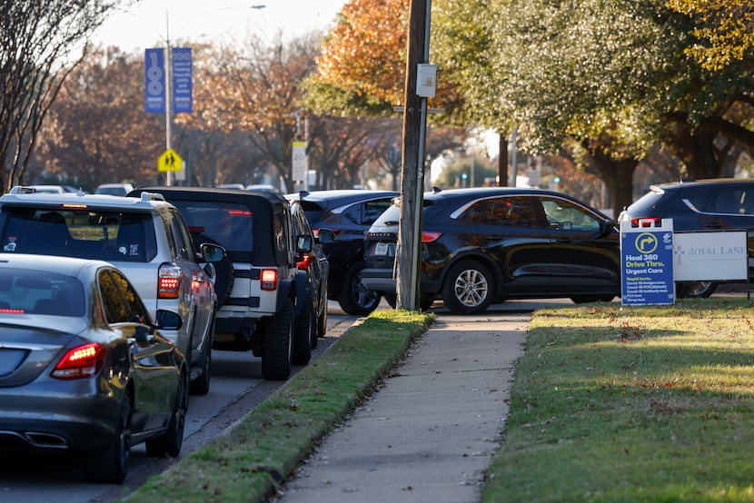 Cars lined up along Royal Lane as people waited for COVID-19 testing at Royal Lane Baptist...