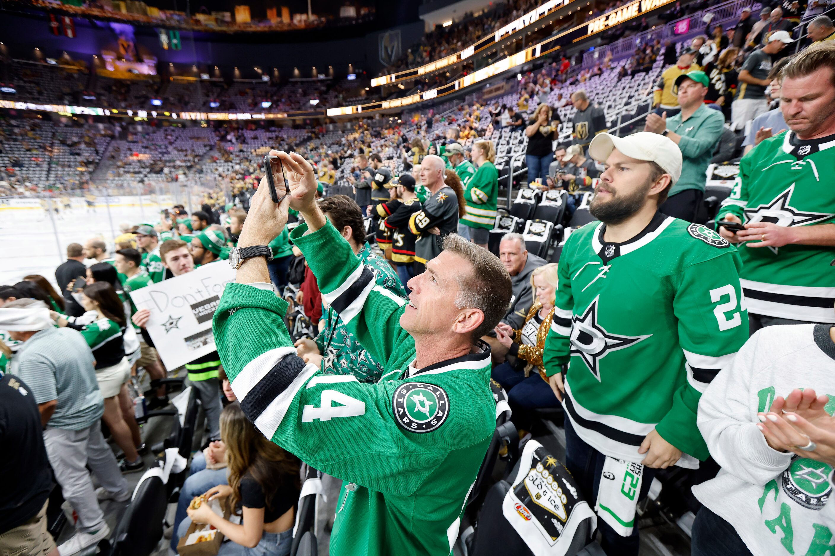 Dallas Stars fans Linda Desrosiers (left) and her friend Haley Ortiz of Los Angeles watch...