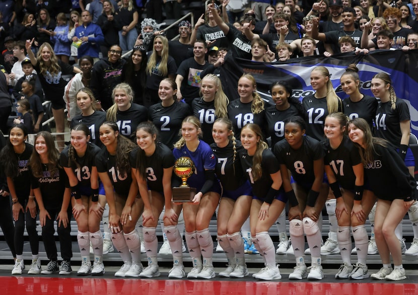 Byron Nelson players pose with their regional trophy after winning in straight sets over...