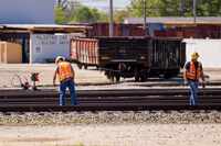 Union Pacific trackmen work at the Union Pacific Railroad rail yard on Thursday, March 28,...