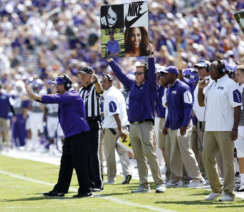 TCU head coach Gary Patterson calls to his players during the third quarter of the TCU and...