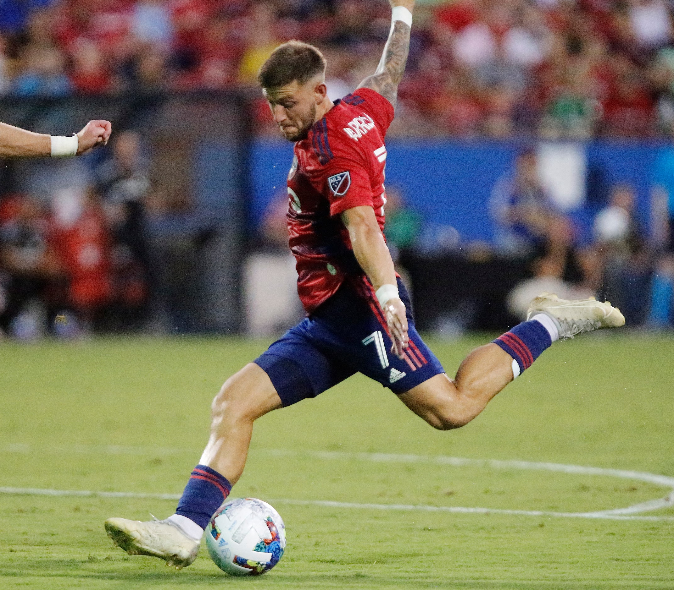 FC Dallas forward Paul Arriola (7) takes a shot to score the only goal during the first half...