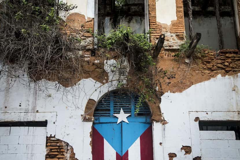 
The flag is painted on the doorway of an abandoned building in San Juan, Puerto Rico’s...