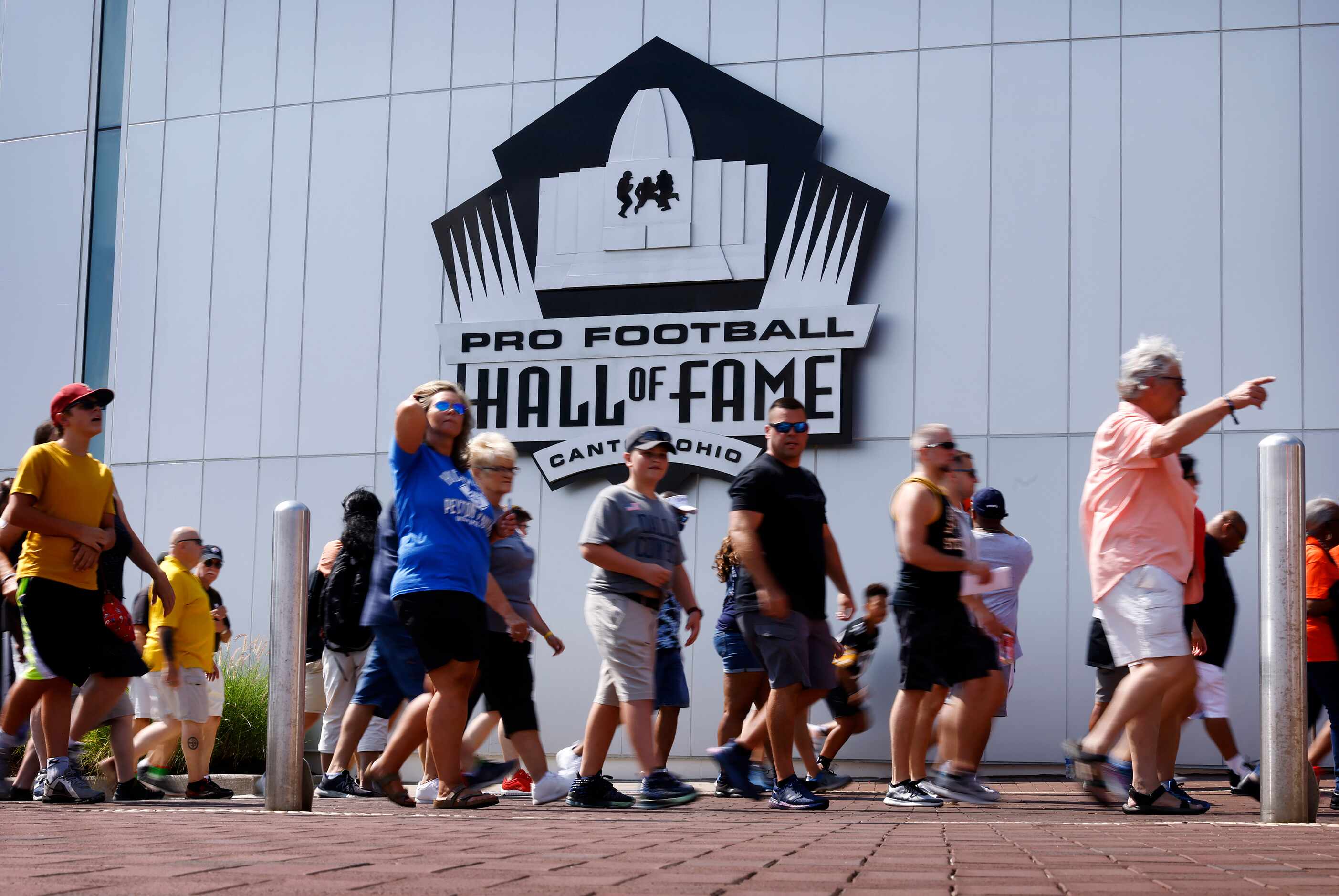 Football fans head for the front door of the Pro Football Hall of Fame in Canton, Ohio...