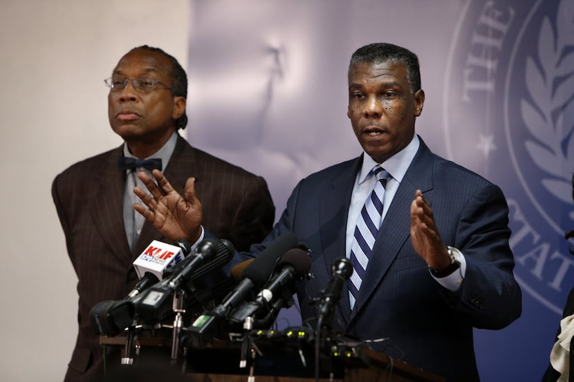 Then-Dallas County Health Director Zachary Thompson (right) and County Commissioner John...