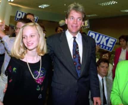  Duke and his daughter Erika enter an election night rally in Kenner, La., in 1992. (AP Photo)