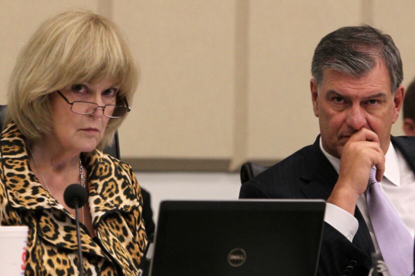 Dallas City Manager Mary Suhm (left) and Dallas Mayor Mike Rawlings listen to citizens'...