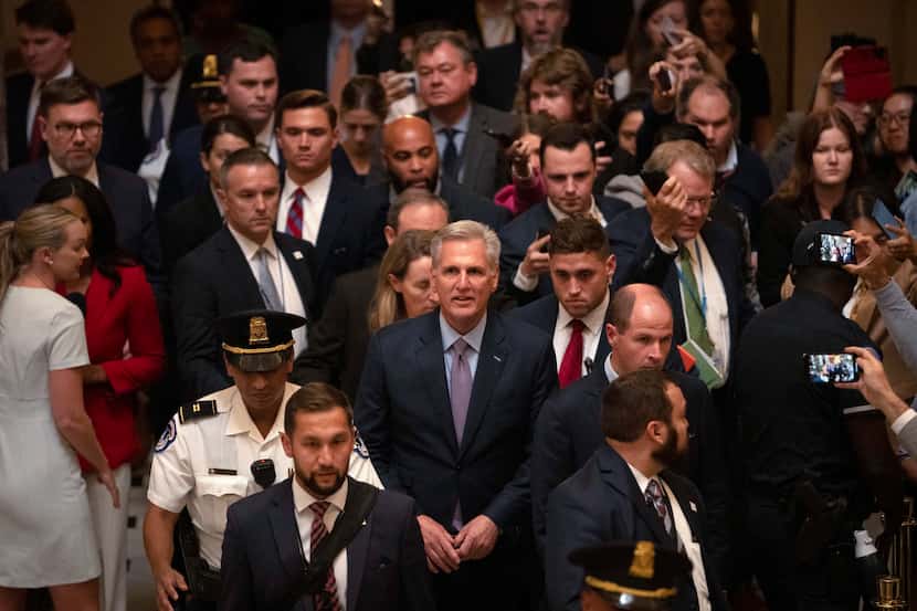 Rep. Kevin McCarthy, R-Calif., leaves the House floor after being ousted as Speaker of the...