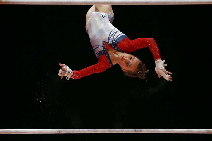 Madison Kocian of the U.S. performs on the uneven bars during the women's apparatus final...