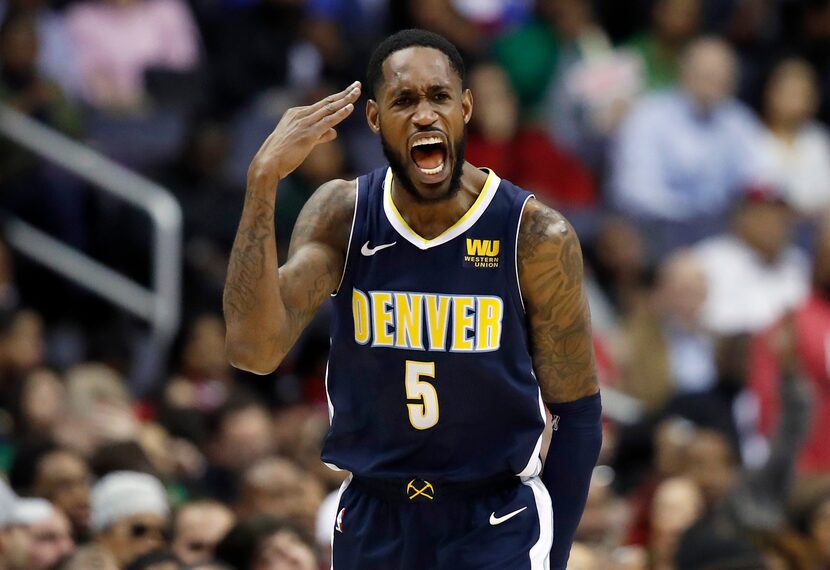 Denver Nuggets guard Will Barton celebrates his three-point basket during the second half of...