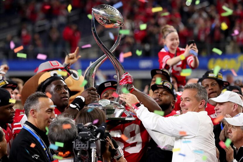 ARLINGTON, TX - DECEMBER 29:  Head coach Urban Meyer of the Ohio State Buckeyes celebrates...