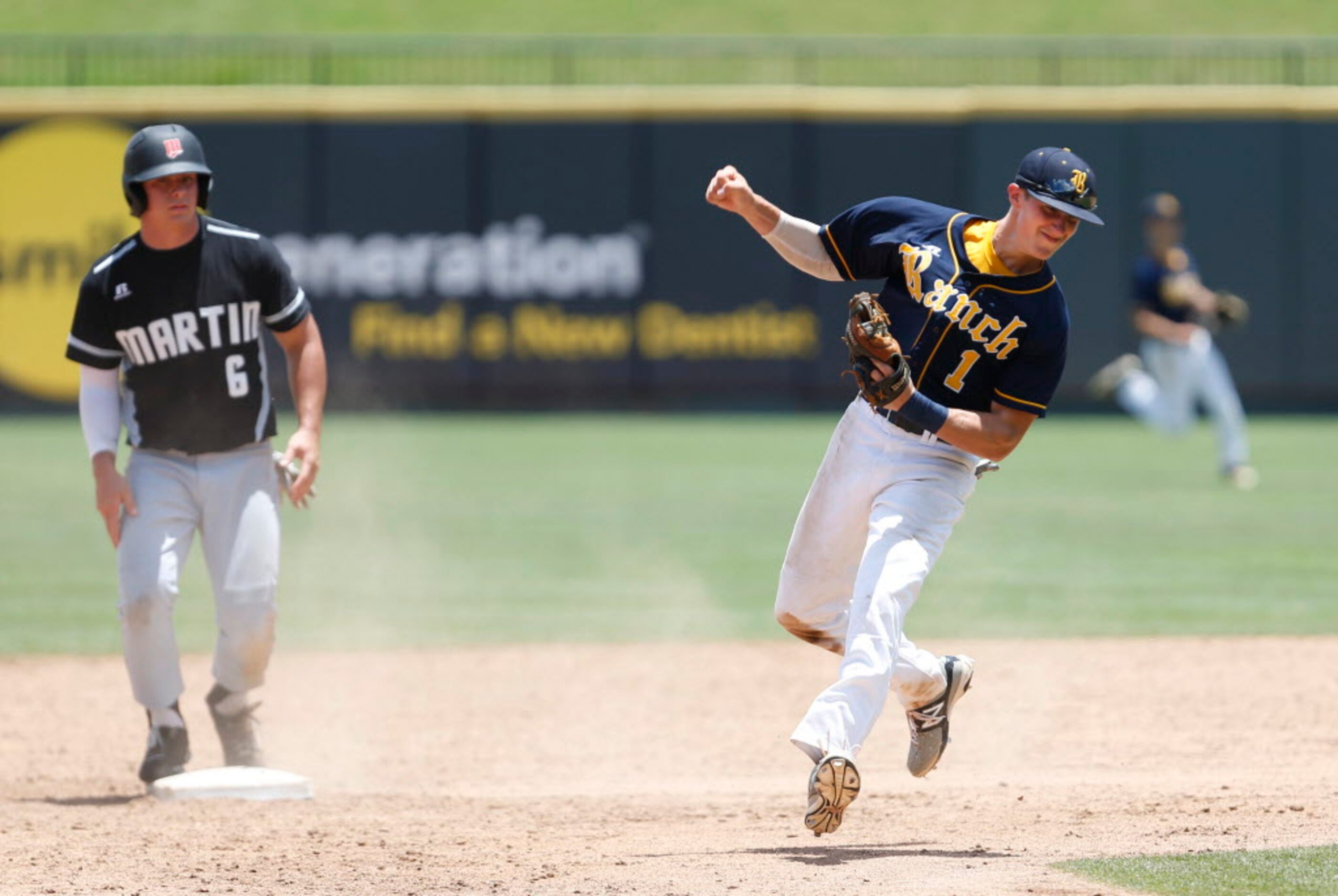 Cypress Ranch's Masen Hibbeler (1) celebrates a double play as Martin's Josh Watson (6)...