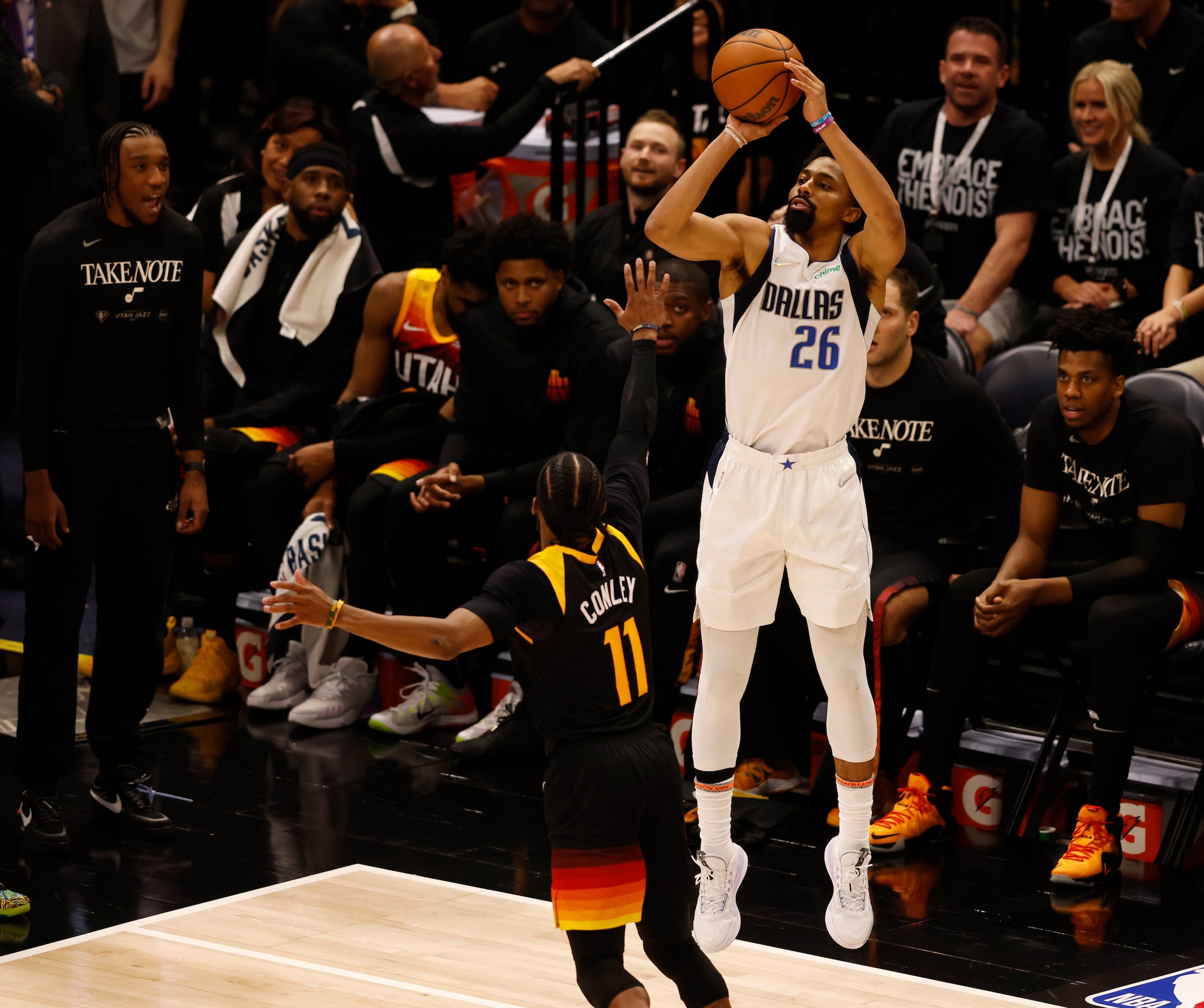 Dallas Mavericks guard Spencer Dinwiddie (26) shoots and makes a three pointer over Utah...