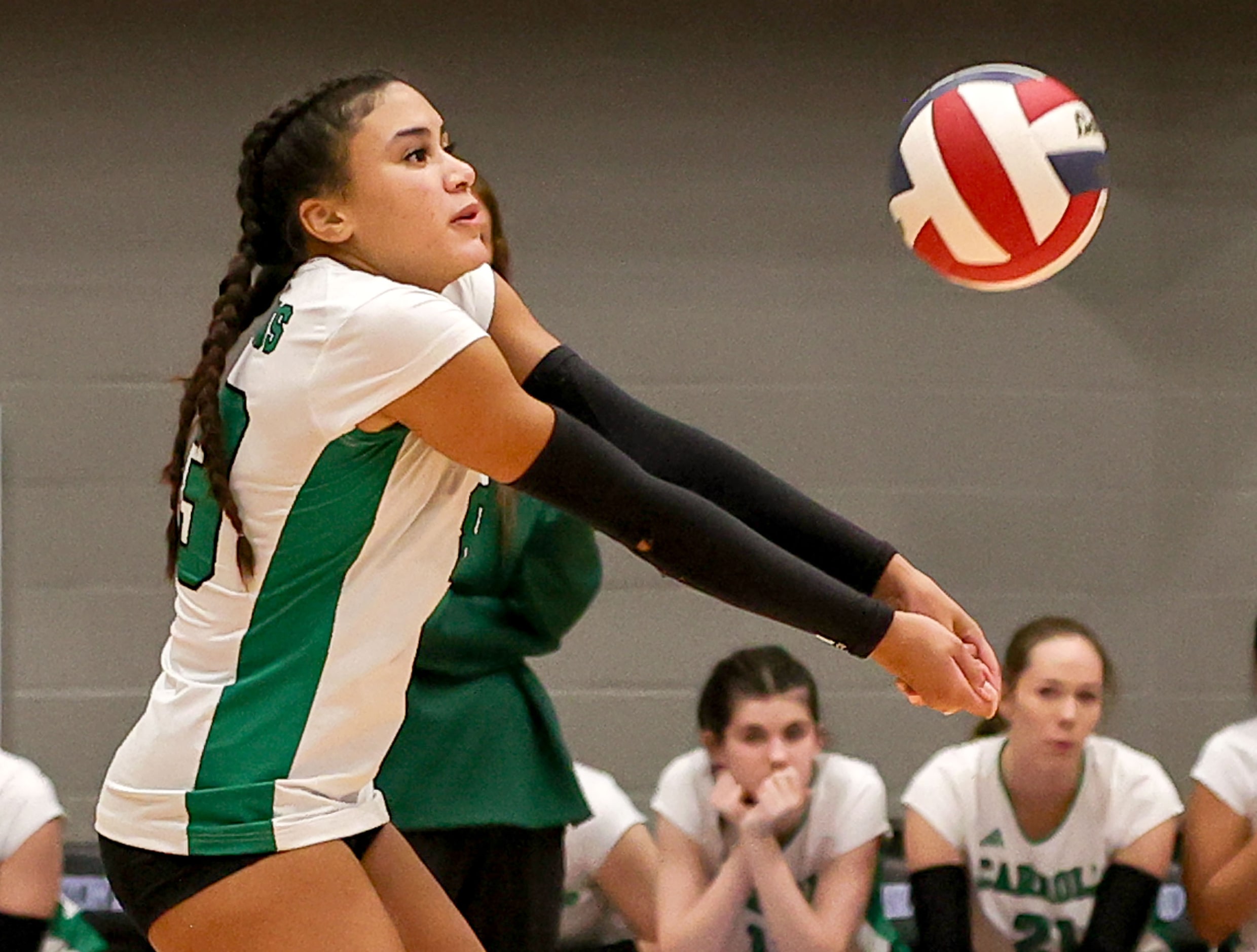 Southlake Carroll's Vanessa Glenn gets a dig against Hebron during a Class 6A Division II...