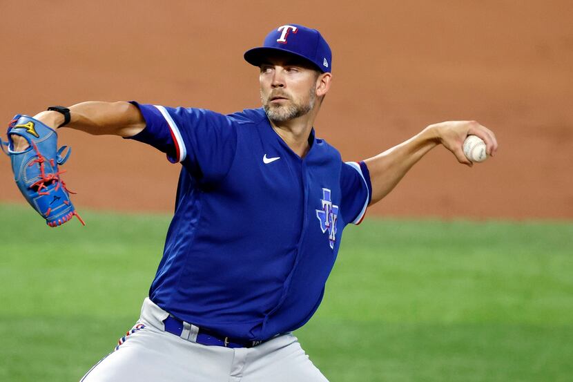 Texas Rangers starting pitcher Mike Minor throws from the mound during a simulated Summer...