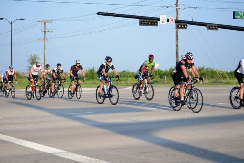 

Shawnee Trail Cycling Club members hit the streets of Frisco. The city only has a few...