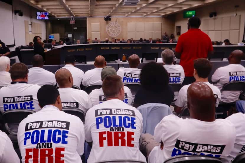 Dallas police officers, first responders and their supporters attend a meeting at Dallas...
