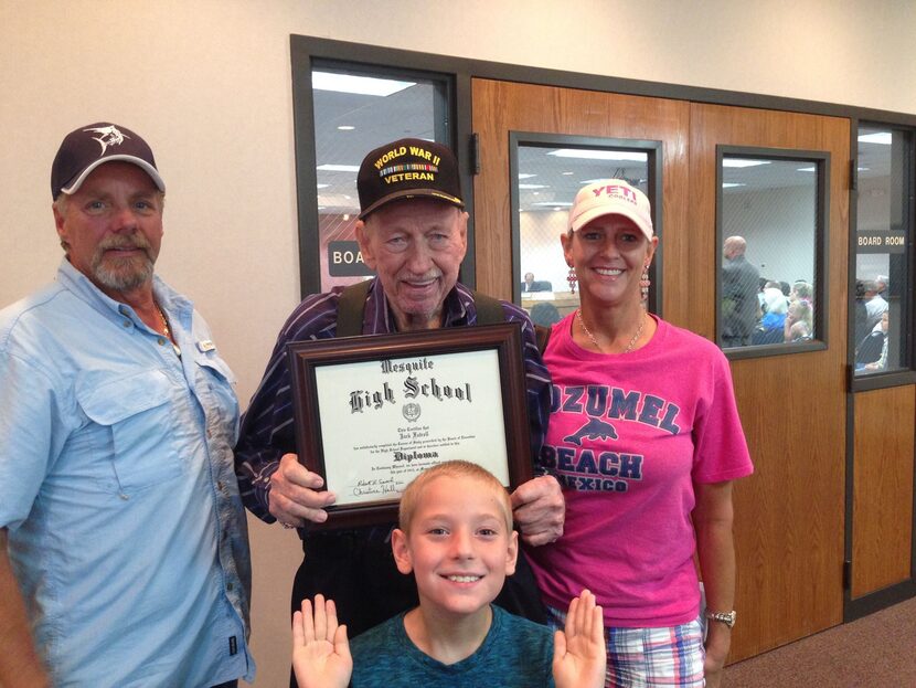 Jack "Cotton" Futrell shows off the honorary diploma he received from the Mesquite ISD...