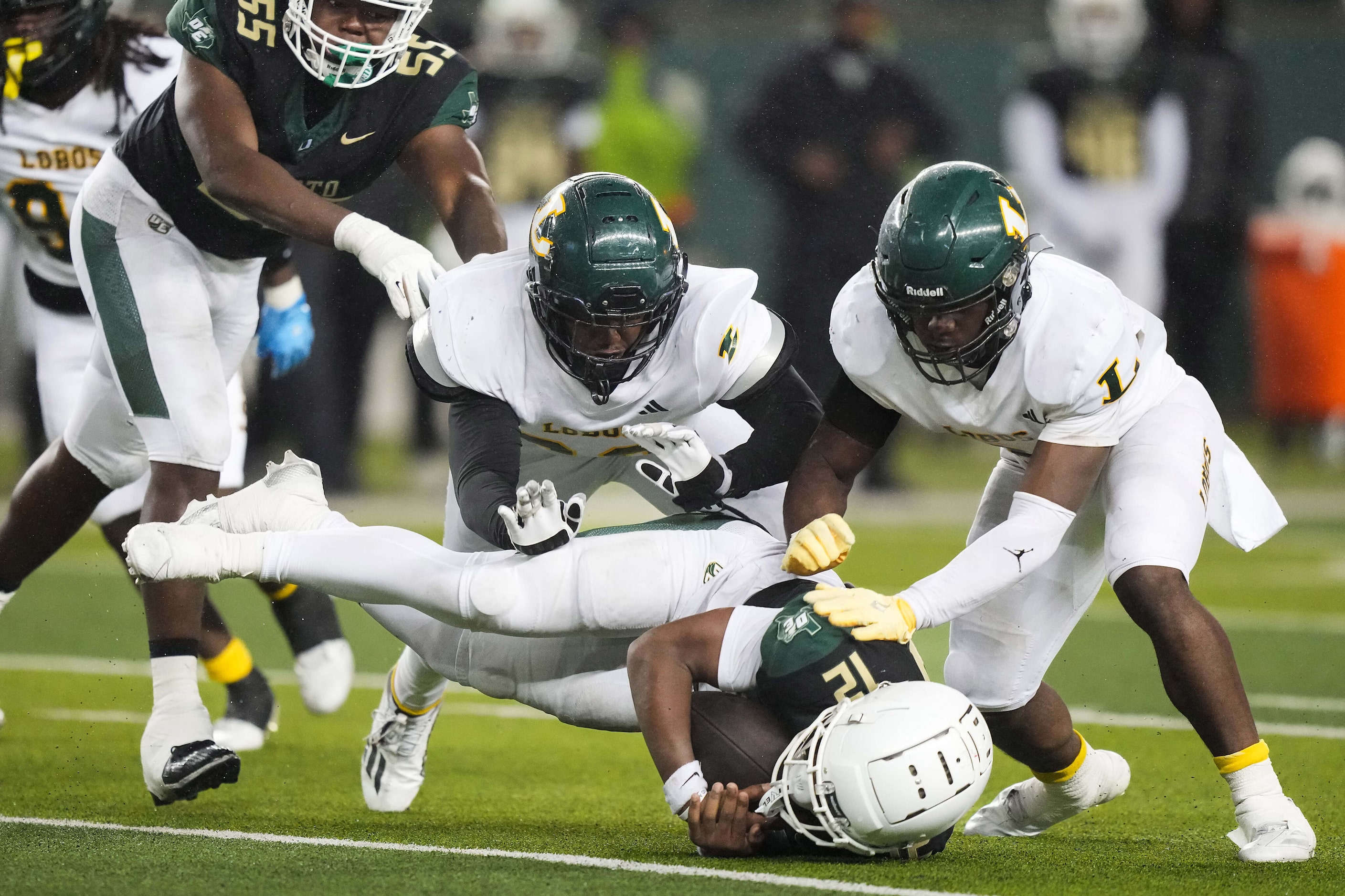 DeSoto running back SaRod Baker (12) is brought down by the Longview defense during the...