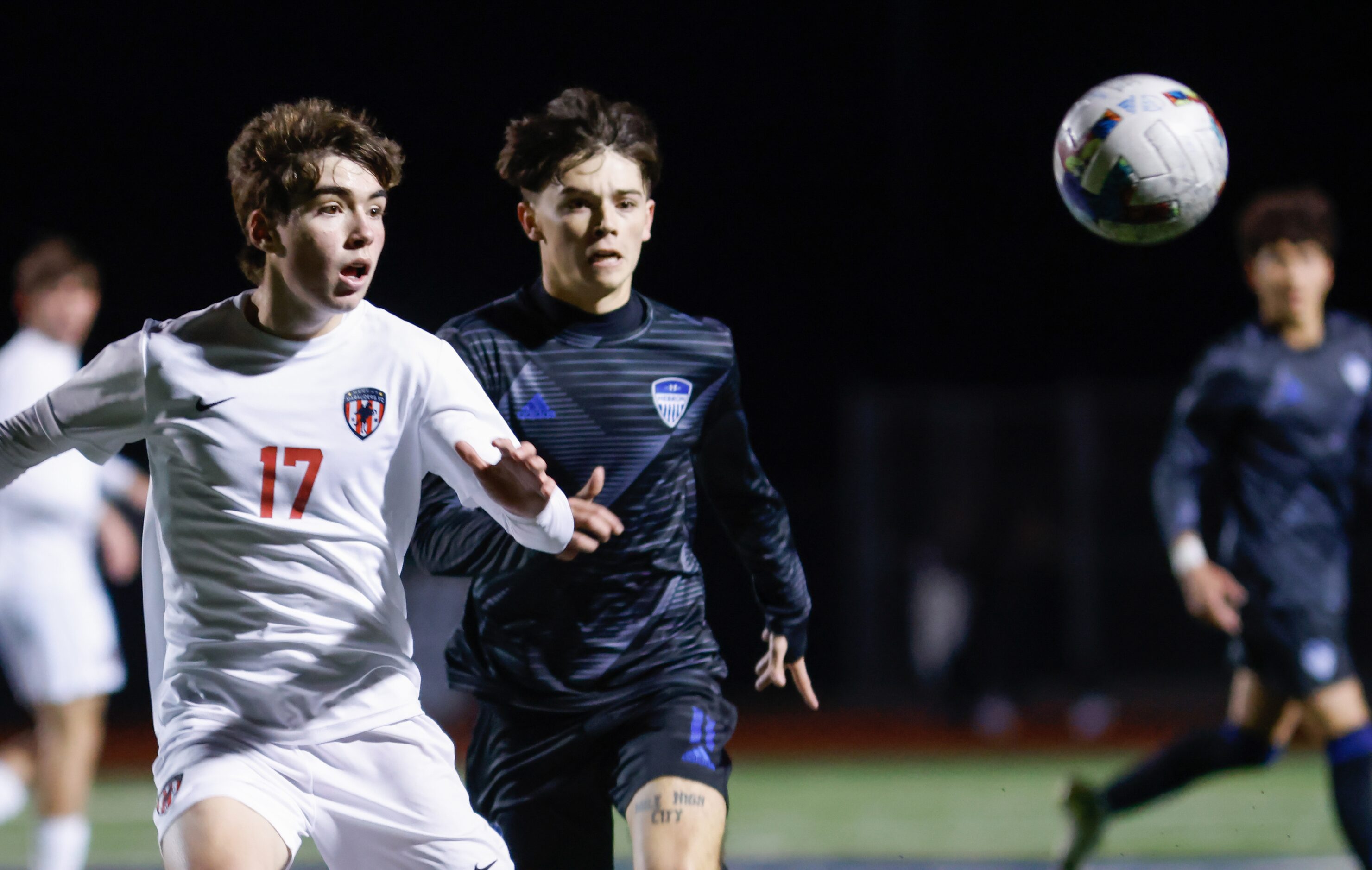 Flower Mound Marcus’ Artian Rifati (17) and Hebron’s Micah Gonzales (11) look at an incoming...