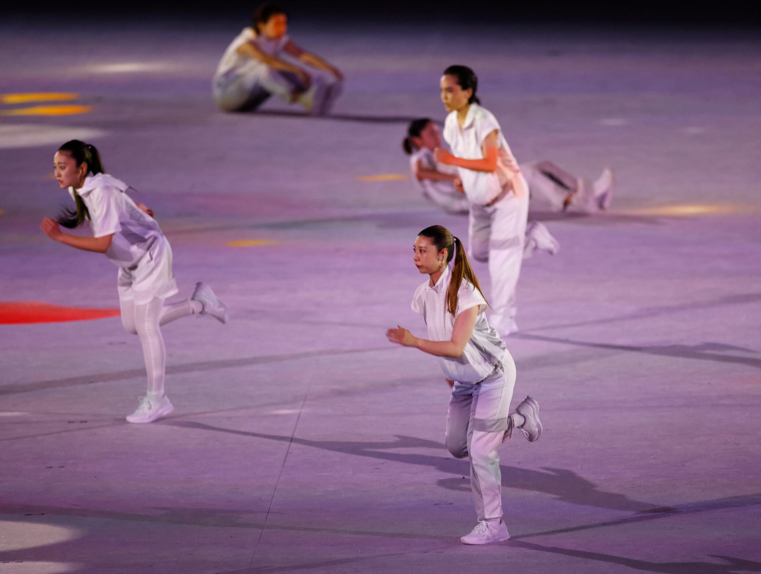 Entertainers performs during the opening ceremony for the postponed 2020 Tokyo Olympics at...