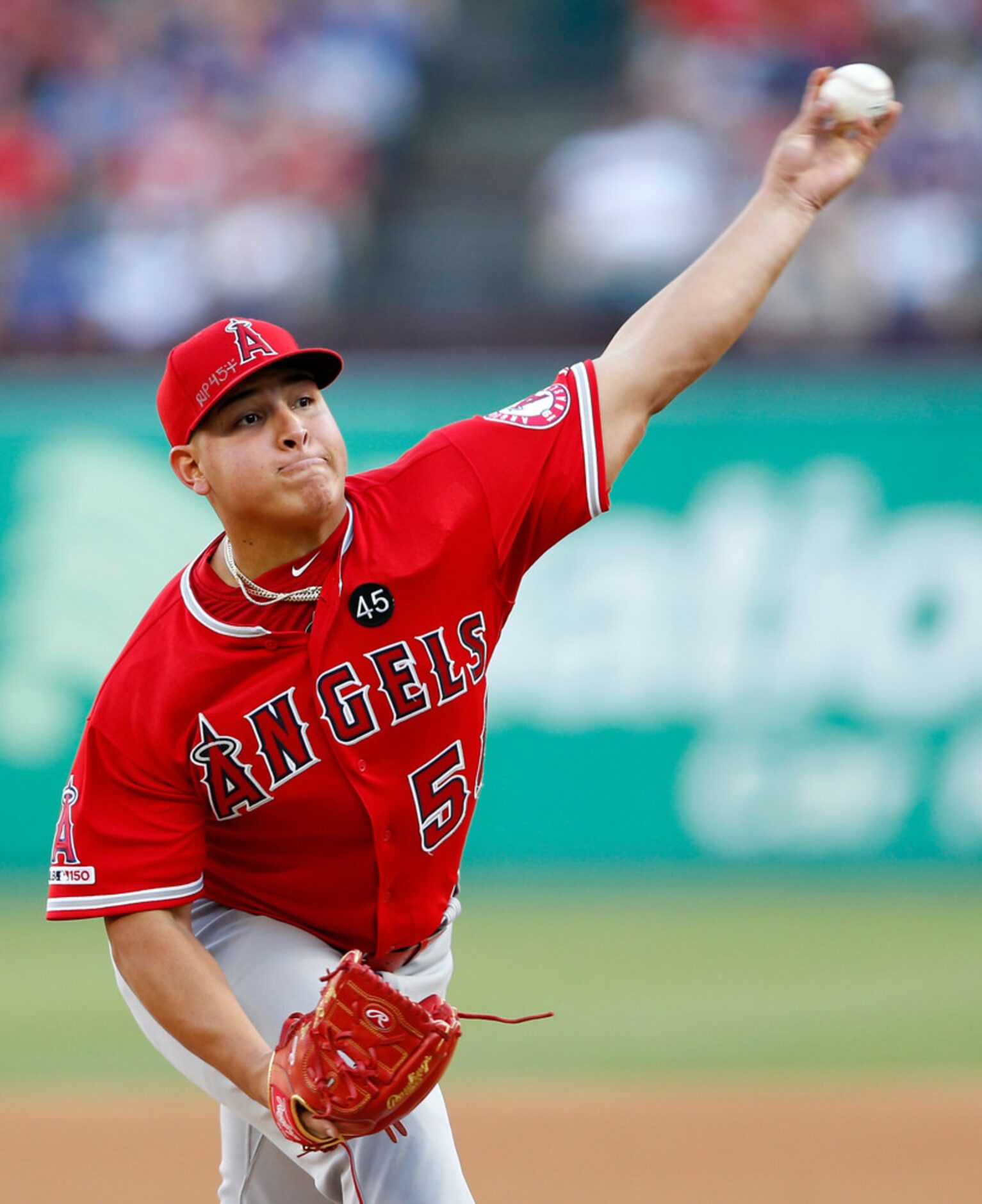 Los Angeles Angels starting pitcher Jose Suarez (54) pitches during the first inning of play...