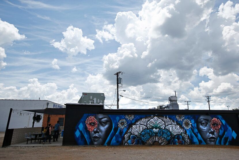 A mural by artist Katherine Rupit on the exterior at Sandwich Hag in the Cedars