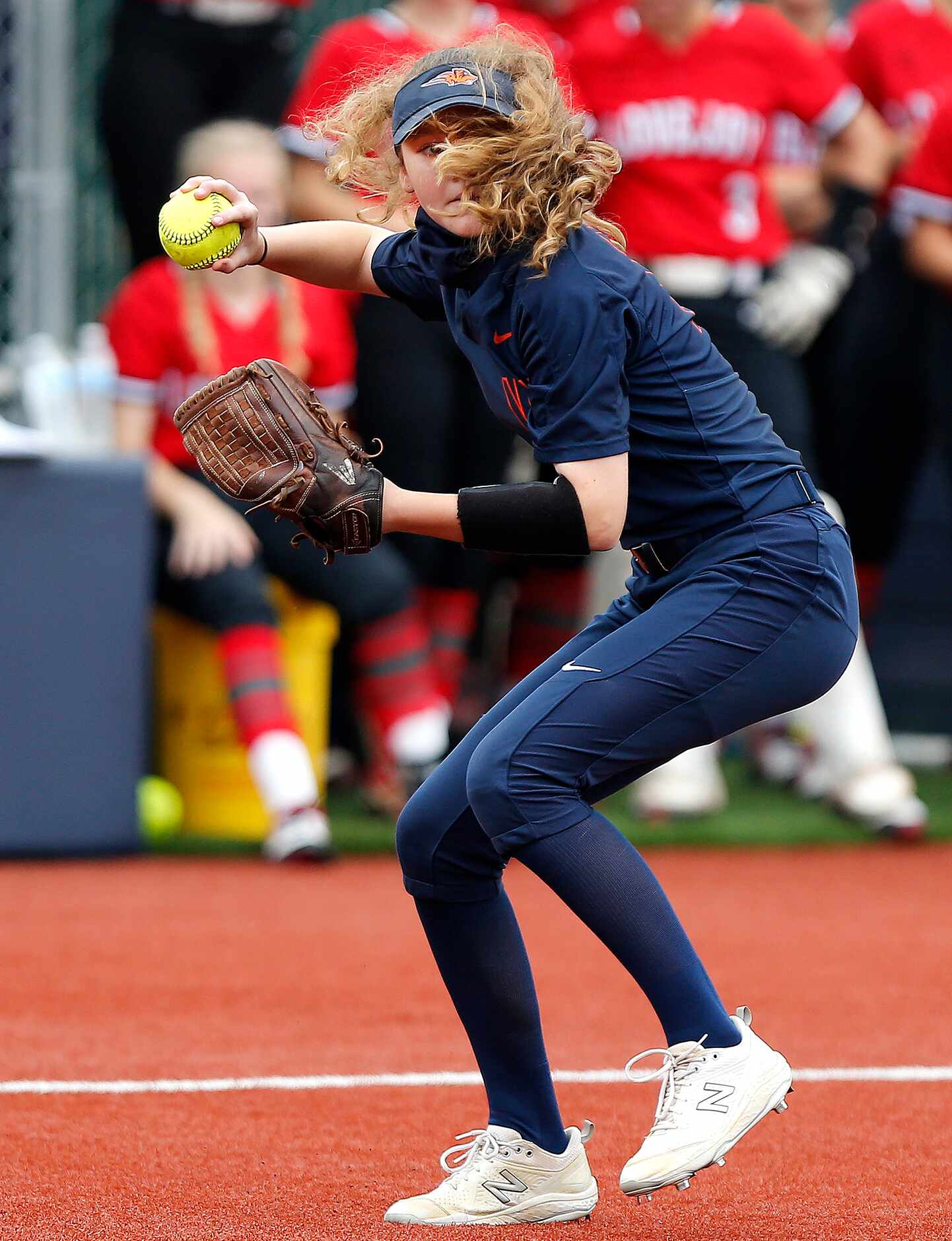 Wakeland third basemanKaitlyn Bower (10) makes the throw for an out in the third inning as...